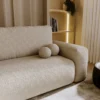 Beżowy narożnik boucle z funkcją spania i pojemnikiem do salonu FILO Beżowy narożnik boucle z funkcją spania i pojemnikiem do salonu FILO
