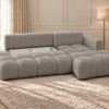 Ciepłoszara sofa w słonecznym wnętrzu Narożnik Soffy prawostronny z funkcją spania i pojemnikiem beżowy boucle
