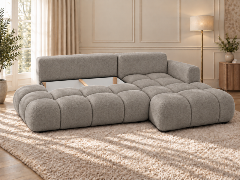 Ciepłoszara sofa w słonecznym wnętrzu Narożnik Soffy prawostronny z funkcją spania i pojemnikiem beżowy boucle