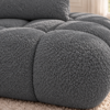 Grafitowa sofa boucle w naturalnym świetle_LEWY Narożnik Soffy lewostronny z funkcją spania i pojemnikiem ciemnoszary boucle