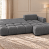 Grafitowa sofa modułowa w przytulnym salonie Narożnik Soffy prawostronny z funkcją spania i pojemnikiem ciemnoszary boucle