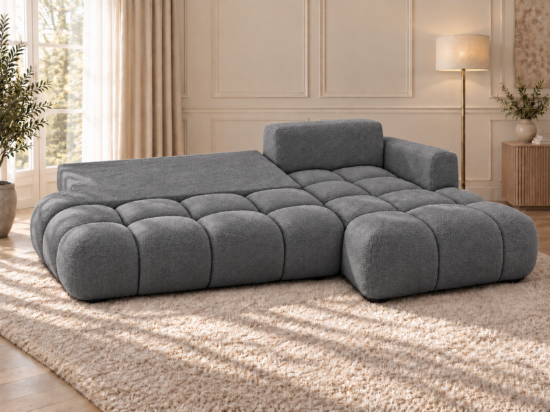 Grafitowa sofa modułowa w przytulnym salonie Narożnik Soffy prawostronny z funkcją spania i pojemnikiem ciemnoszary boucle