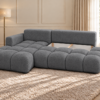 Grafitowa sofa w jasnym salonie_LEWY Narożnik Soffy lewostronny z funkcją spania i pojemnikiem ciemnoszary boucle