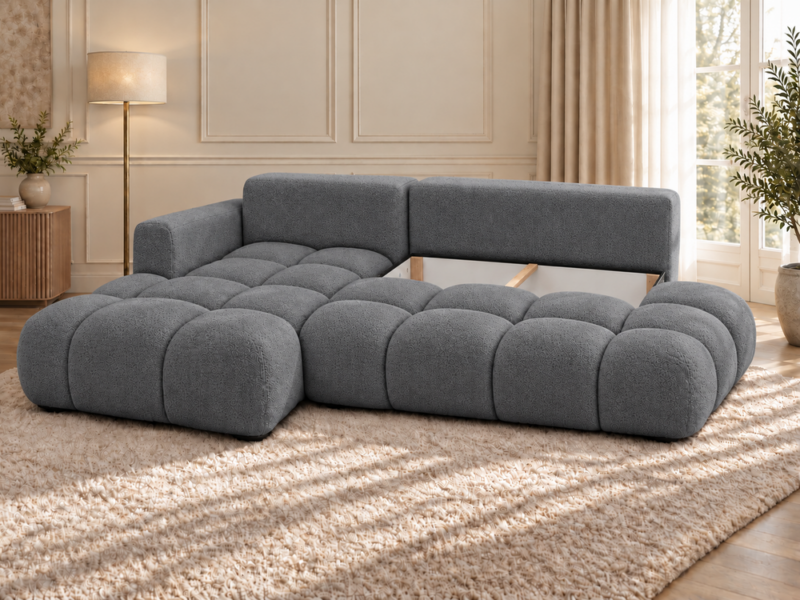 Grafitowa sofa w jasnym salonie_LEWY Narożnik Soffy lewostronny z funkcją spania i pojemnikiem ciemnoszary boucle