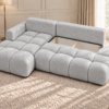 Jasnoszara sofa narożna w słonecznym salonie_LEWY Narożnik Soffy lewostronny z funkcją spania i pojemnikiem szary boucle
