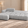 Jasnoszara sofa w ciepłym wnętrzu_LEWY Narożnik Soffy lewostronny z funkcją spania i pojemnikiem szary boucle