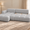 Jasnoszara sofa w eleganckim wnętrzu_LEWY Narożnik Soffy lewostronny z funkcją spania i pojemnikiem szary boucle