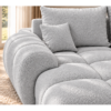 Jasnoszara sofa w słonecznym wnętrzu Narożnik z funkcją spania i pojemnikiem Aurio lewy szary boucle