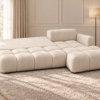 Kremowa sofa modułowa w miękkim świetle Narożnik Soffy prawostronny z funkcją spania i pojemnikiem kremowy boucle