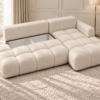 Kremowa sofa w miękkim świetle Narożnik Soffy prawostronny z funkcją spania i pojemnikiem kremowy boucle