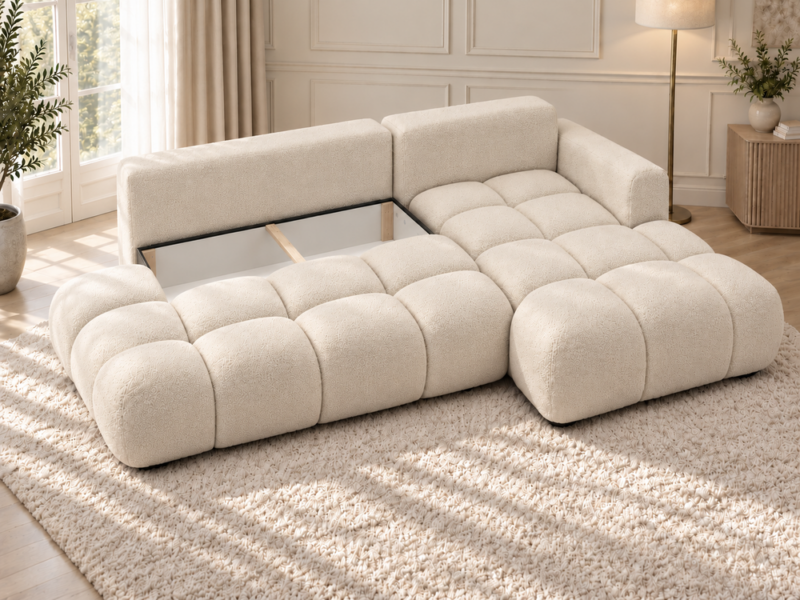 Kremowa sofa w miękkim świetle Narożnik Soffy prawostronny z funkcją spania i pojemnikiem kremowy boucle