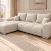 Kremowa sofa w ujęciu z prawej Narożnik z funkcją spania i pojemnikiem Aurio lewy kremowy boucle