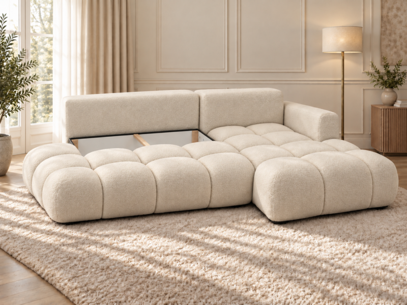 Kremowa sofa z otwartym schowkiem Narożnik Soffy prawostronny z funkcją spania i pojemnikiem kremowy boucle