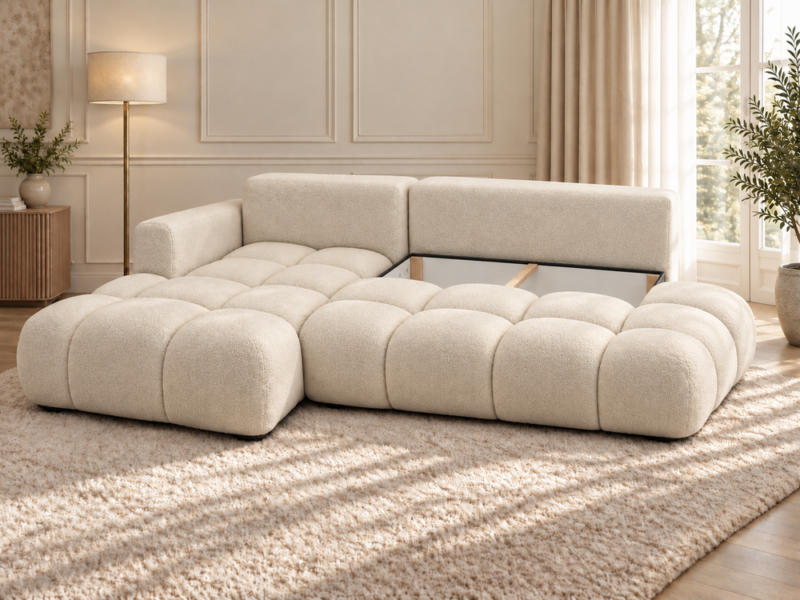 Kremowa sofa z otwartym schowkiem_LEWY Narożnik Soffy lewostronny z funkcją spania i pojemnikiem kremowy boucle