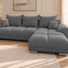 Neutralnoszara sofa boucle w salonie_PRAWY Narożnik z funkcją spania i pojemnikiem Aurio prawy ciemnoszary boucle