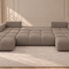 Rozłożona sofa U w ciepłym taupe Narożnik z funkcją spania i pojemnikiem Milo U beżowy boucle