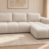 Sofa Agnello w eleganckim salonie_PRAWY Narożnik z funkcją spania i pojemnikiem Milo prawy kremowy boucle