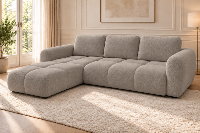 Sofa bouclé w ciepłym taupe Narożnik z funkcją spania i pojemnikiem Milo lewy beżowy boucle