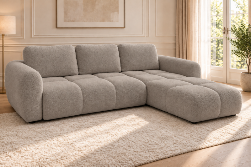 Sofa bouclé w ciepłym taupe_PRAWY Narożnik z funkcją spania i pojemnikiem Milo prawy beżowy boucle