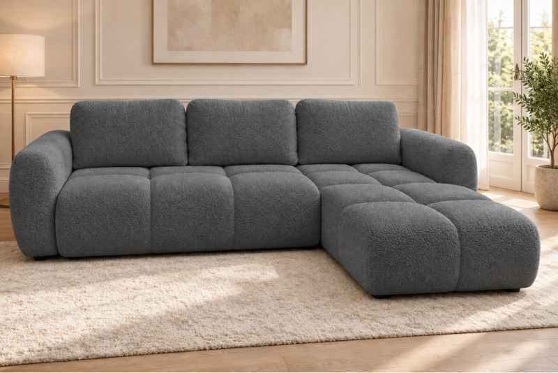 Sofa w grafitowej tapicerce_PRAWY Narożnik z funkcją spania i pojemnikiem Milo prawy ciemnoszary boucle