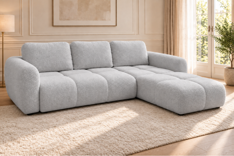 Sofa w jasnoszarej tapicerce (1)_PRAWY Narożnik z funkcją spania i pojemnikiem Milo prawy szary boucle