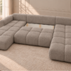 Sofa w przygaszonym odcieniu taupe Narożnik z funkcją spania i pojemnikiem Milo U beżowy boucle