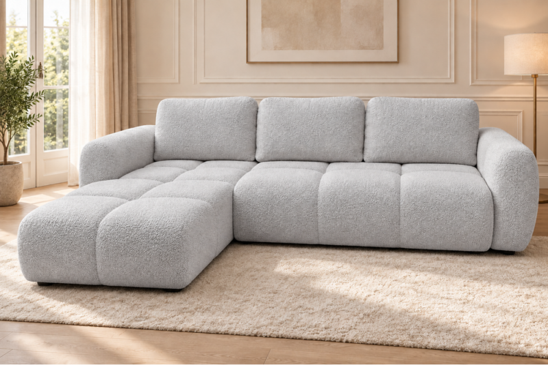 Szara sofa w ciepłym salonie Narożnik z funkcją spania i pojemnikiem Milo lewy szary boucle