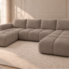 U-kształtna sofa w odcieniu taupe Narożnik z funkcją spania i pojemnikiem Milo U beżowy boucle